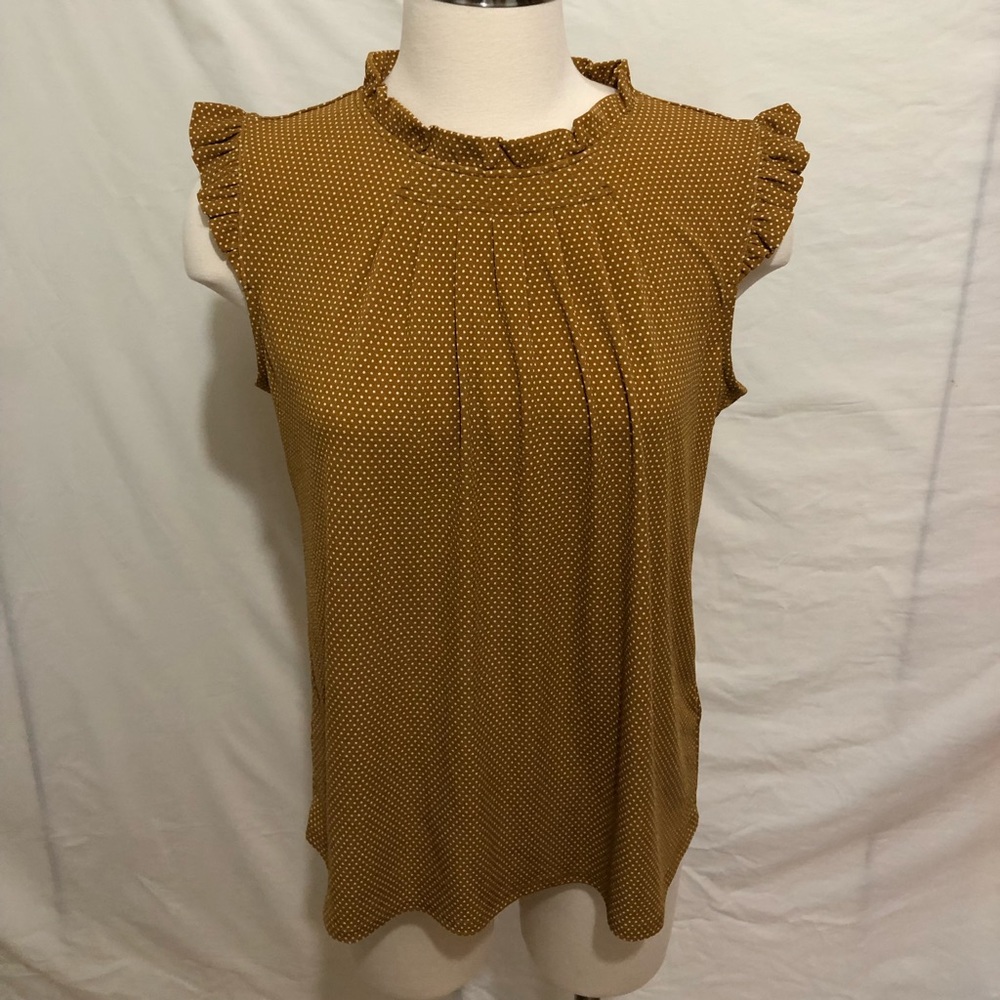Polka dot sleeveless ruffled top